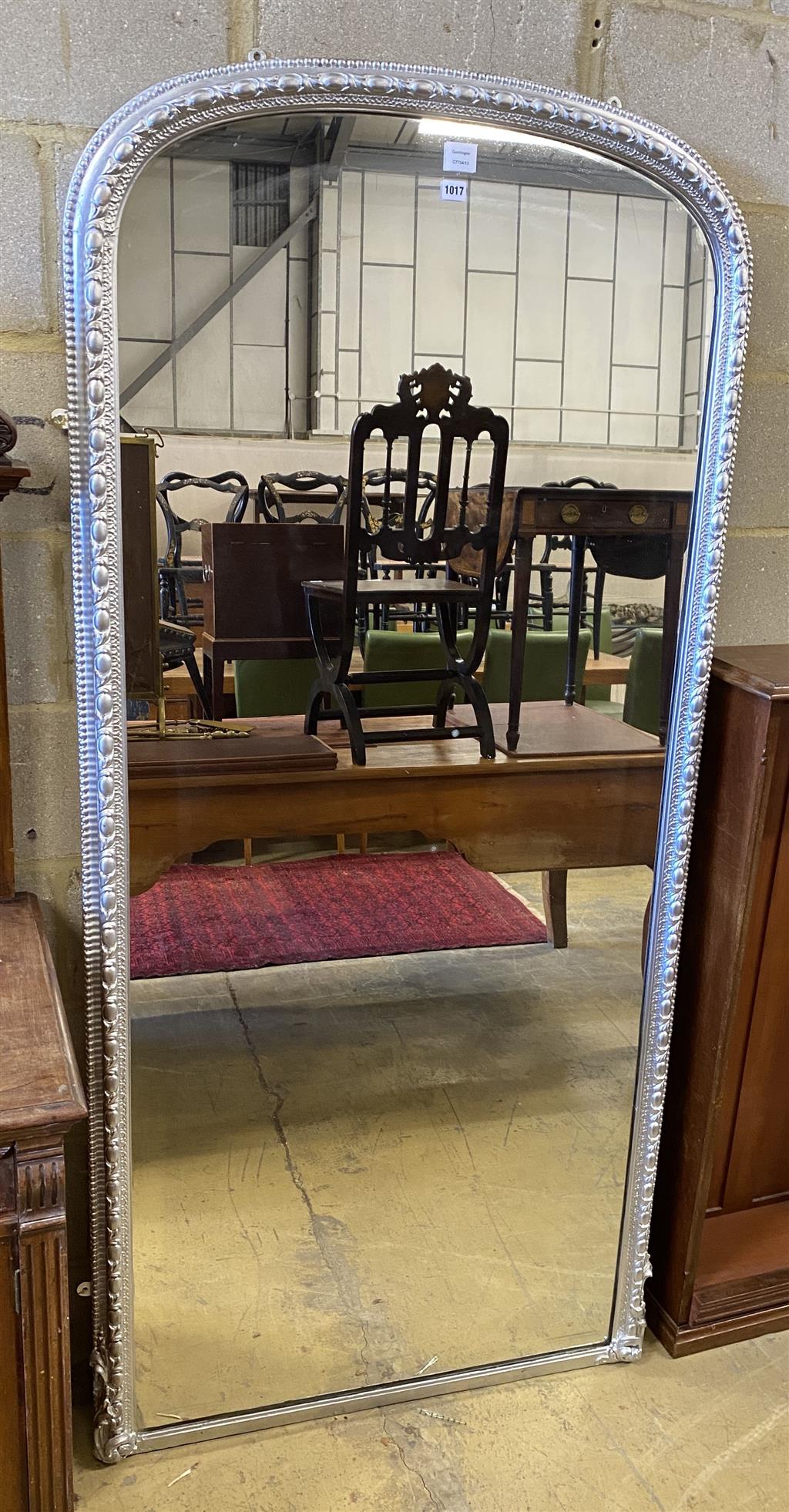 A Victorian, later silvered carved wood framed overmantel mirror, width 92cm, height 195cm